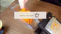 Let's deal with vegetables. Grate the carrots on a...