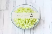 Wash the cucumber, dry it. Cut into small straws o...