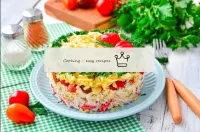 Layered salad with crab sticks...