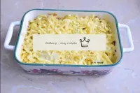 Then remove the tin from the oven, sprinkle with t...