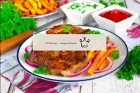 Serve the finished fried pork neck to the table wi...