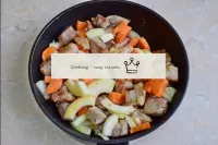 Then add the prepared onions and carrots to the me...