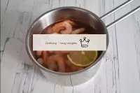 Boil the shrimp in water until cooked according to...