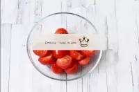 Wash the tomatoes, dry. Cut the regular tomatoes i...