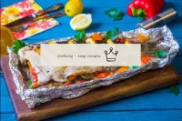 The silver carp in the oven baked in foil whole...