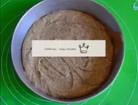 We cover the baking tin with parchment paper, grea...