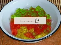 Put the cubes of colored jelly in a large containe...