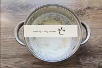 Transfer the sour cream to a deep bowl and whisk i...