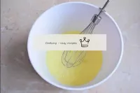 Mix the eggs with a whisk. Stirring constantly, pu...