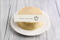 Collect the whole cake in this way. Brush the side...
