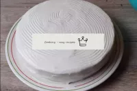 When the cake is made, coat it with cream on all s...