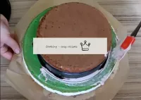 Place the top, smaller portion of the cake on top....