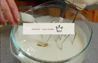 Pour vegetable oil into a bowl of sugar-egg mass. ...