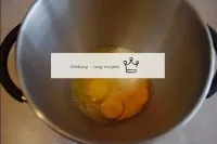 In a whipping bowl, combine the eggs with the suga...