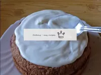 Brush the top of the cake with the remaining cream...