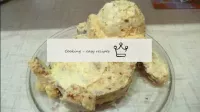 Mix the biscuit crumb with the cream and brush the...