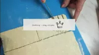Cut each strip of dough with a knife, not reaching...