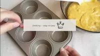 Grease the muffin tin with vegetable oil (if you u...