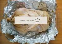 Wrap the stuffed duck in foil, put in a baking dis...