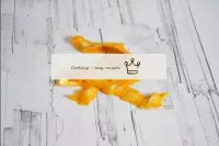 Remove a thin layer of zest from the orange, tryin...