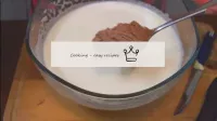 Put in the egg-sugar mixture in parts of cocoa wit...