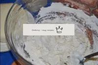 Pour warm boiled water into the flour, stirring th...