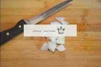 Peel the onions and cut into a small cube. You can...