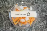 Place the chopped onions and carrots on top of the...