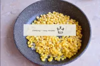 Then put the corn in the pan. Frozen corn will def...