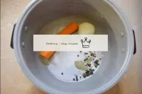 Wash the carrots. Peel it together with the bulb o...