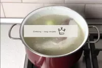 Bring the water back to the boil and toss a peeled...