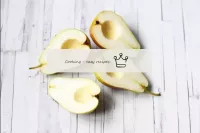 Wash the pears, dry and cut in half. Carefully rem...