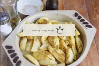 Place the potatoes in a tin, salt, pepper, sprinkl...