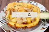 Serve the baked pineapple hot. This dish is self-s...
