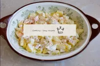 Cut the peeled potatoes into pieces and place in t...