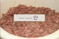 Pass the meat through a meat grinder along with on...