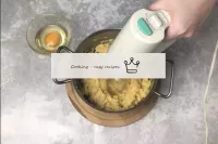 Cool the dough a little. Start driving eggs into i...