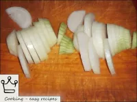The onions are peeled and thinly chopped. ...