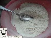 Flour is sieved, mixed with soda. ...