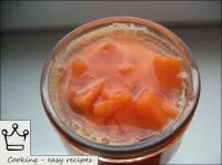 Pickled pumpkin together with hot marinade is tran...