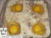 Release 1 raw egg into each hole. ...