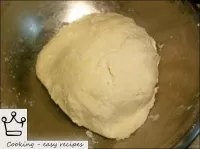 Knead the curd dough with your hands, wrap it in a...