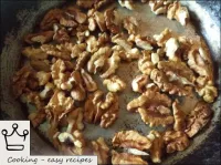 Put the nuts in a dry pan, fry on a medium heat st...