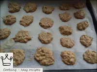 Cover the baking sheet with parchment paper. Lay o...