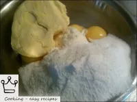 Add butter and powdered sugar with vanillin. ...