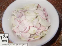 Radish salad with cucumbers and sour cream is read...