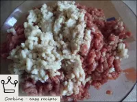 Mix the meat with milk soaked and squeezed white b...