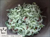 Meat and onion-dill mixture are laid in cauldron i...
