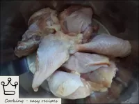 The chicken is placed in a saucepan. ...