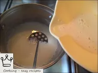 A mixture of eggs and flour is gradually poured in...